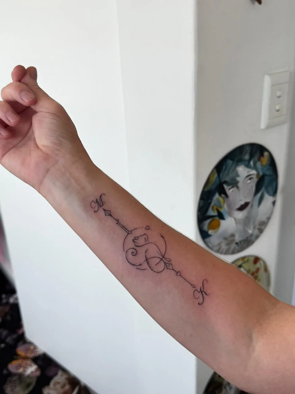Script and kitty forearm piece